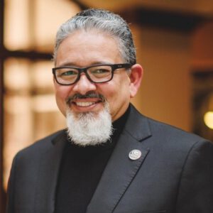 Professional headshot of Rick Gallot in business attire